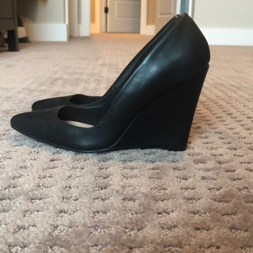 Black closed toe wedges